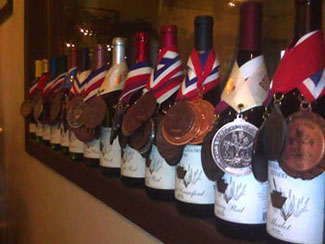 A row of winning wines is shown with their awards from 2015 and 2016.